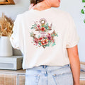 Woman wearing a Be Still and Know Hope Anchor Floral Shirt with Hawaiian flowers and 