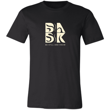 A Blessed Beginnings Tee in Black featuring the word 'bask' in the Be Still and Know logo design.