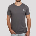 Man in a gray Be Still and Know Fearless Shirt with a small white logo on the left chest, standing against a neutral background.