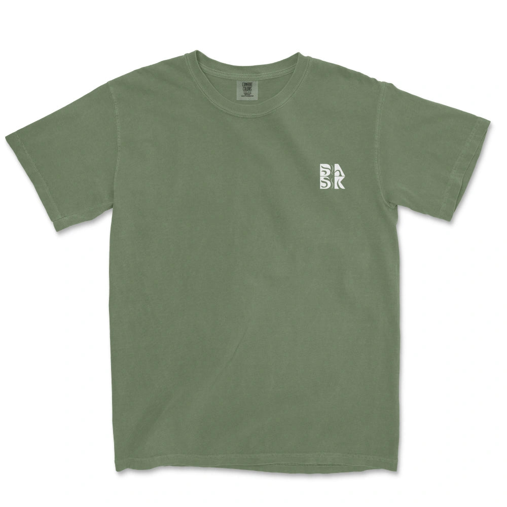Olive green God Means It For Good shirt with a small white logo on the left chest by Be Still and Know.