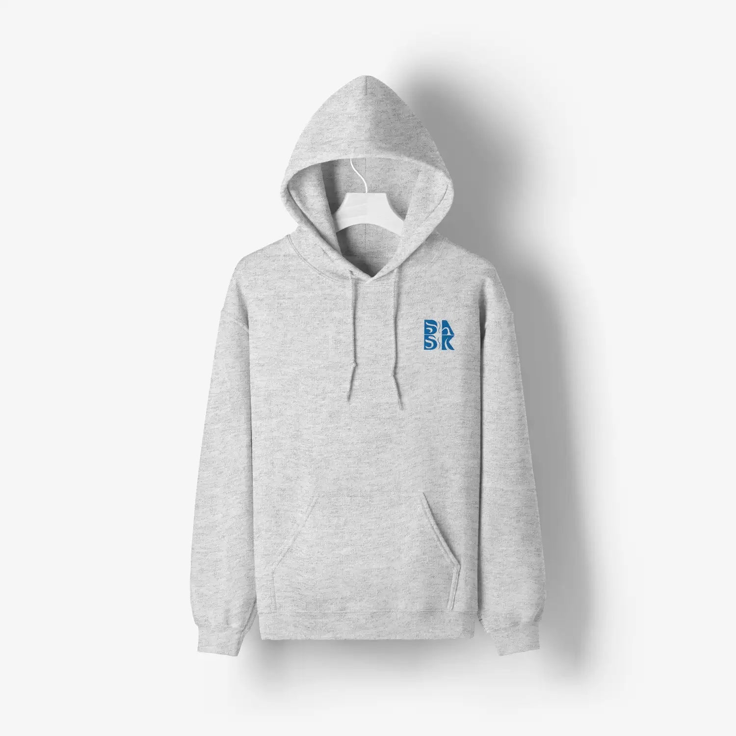 A Hawaiian-inspired Be Still and Know Kupa'a Tide Hoodie in grey with the letter b on it.