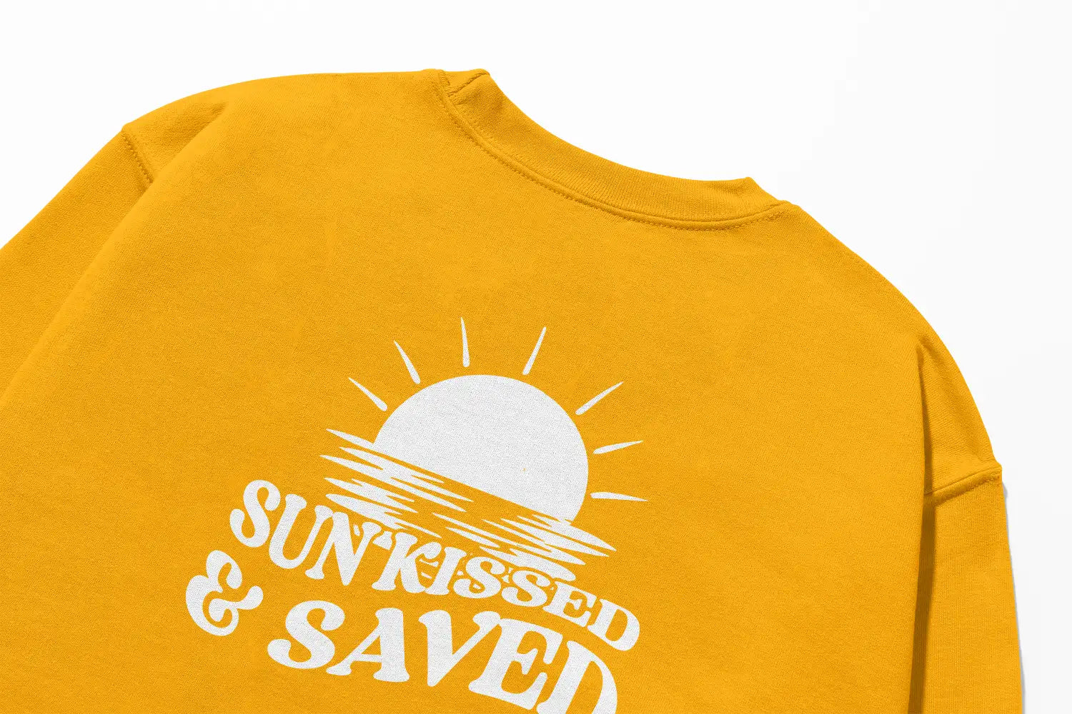 A warm yellow Sunkissed & Saved Sweatshirt that says "sun kissed" and brings faith, by Be Still and Know.