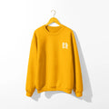 A Be Still and Know Sunkissed & Saved sweatshirt with the letter r on it, representing faith.