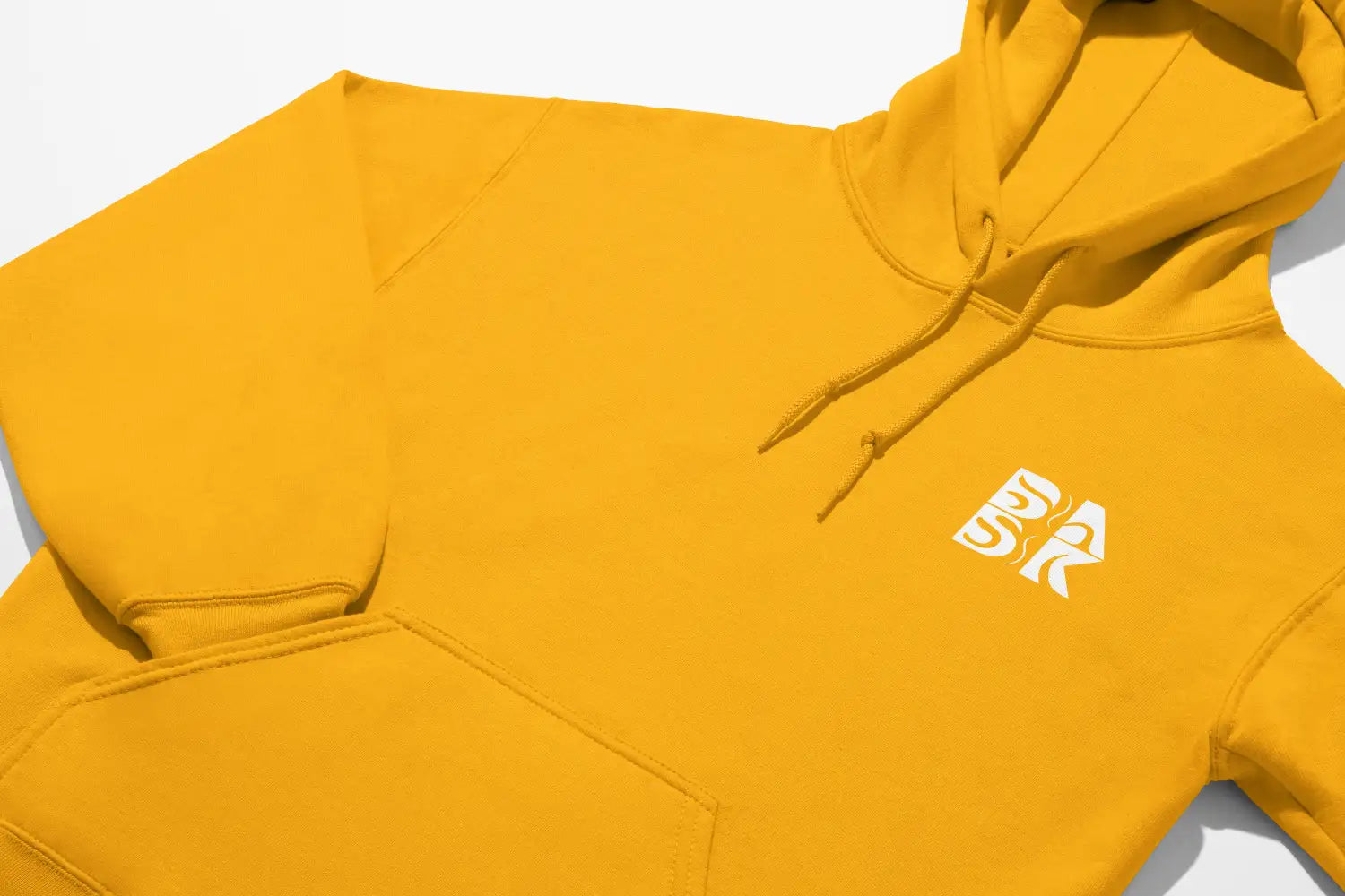 A warm Sunkissed & Saved Hoodie by Be Still and Know with a white logo on it.