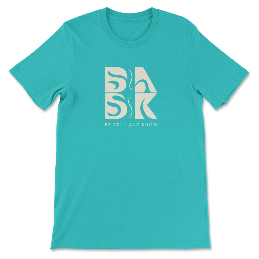 A turquoise Aloha Maluhia In Teal t-shirt with the word BSAK on it, perfect for Christian Apparel from the brand Be Still and Know.