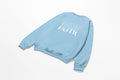 A blue Water Walking Faith Sweatshirt with white text that says 