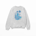 A Kupa'a Tide Sweatshirt by Be Still and Know with a blue wave design.